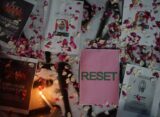 Poster, bunga, dan lilin yang menjadi simbol aksi September Hitam (sumber: BP2M)