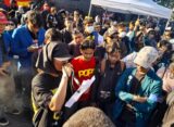 Salah satu massa aksi demo buruh sedang membacakan tuntutan di depan Kantor Gubernur Jawa Tengah, Jumat (01/05/2026) [Husain/BP2M]